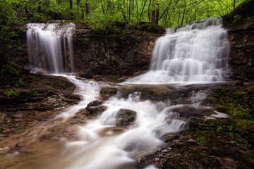 Fototapeta na wymiar Hemmed in Twin Waterfall