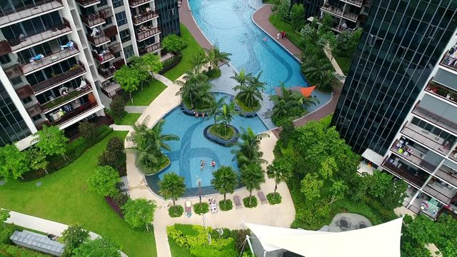 This shot is a drone rising shot from the city of Singapore in a condominium at lakeside. This is the city where crazy rich asians was filmed.