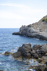 Fototapeta na wymiar Rocky Shores of a Mallorca, Spain Sea