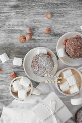 Cacao, chocolate cupcakes, nuts and different decorations