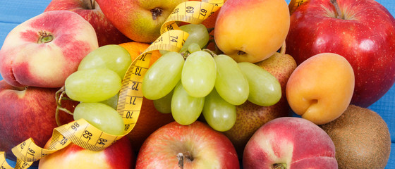 Centimeter with nutritious food as source natural minerals, vitamins and fiber, slimming and healthy lifestyles concept