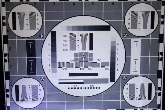 The TV test card with geometric cues. The equipment is retro.