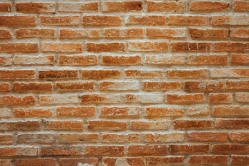 Obraz premium Old brown and red brick wall