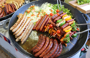 big pan and many frankfurters