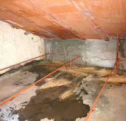 wet attic with moisture problems and infiltrations from the roof