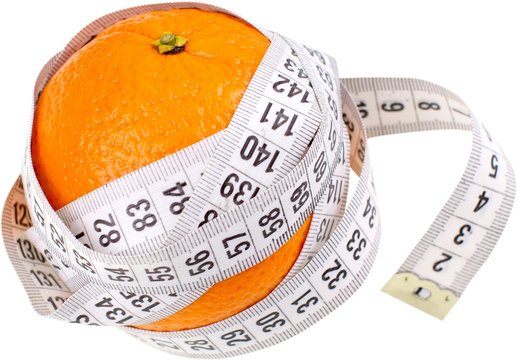 Orange with tape measurer around it - diet concept