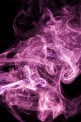 Purple smoke on black background