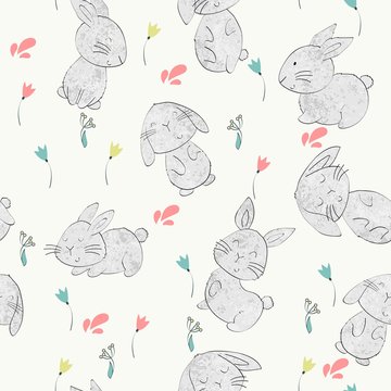 Vector seamless pattern with cartoon cute bunnies