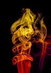 Obraz premium Colored smoke on black background