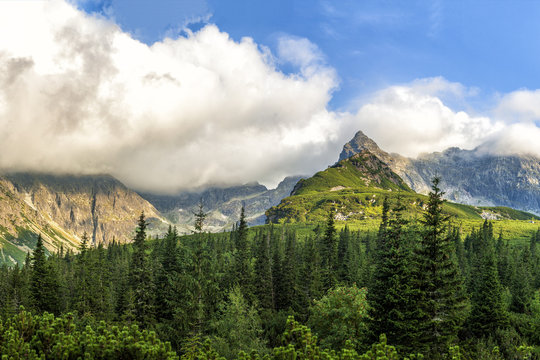 Polish Tatra mountains summer landscape with blue sky and white clouds. HDR image
