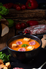 Hungarian paprika cream soup with spicy sausage
