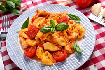 Traditional italian dish - tortellini with tomato sauce