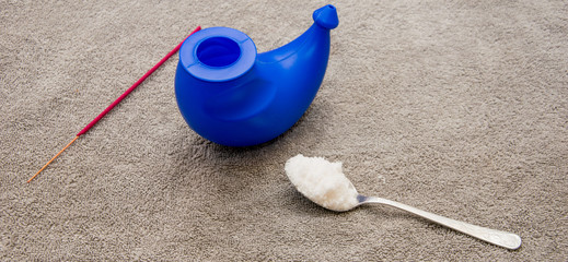 The device for performing yoga practice - jala neti (washing the nose). Neti pot and salt for...