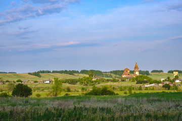 landscape of an old forgotten village abandoned dilapidated temple, the summer day