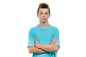 Portrait of smiling teenager boy 14, 15 years old, white background isolated