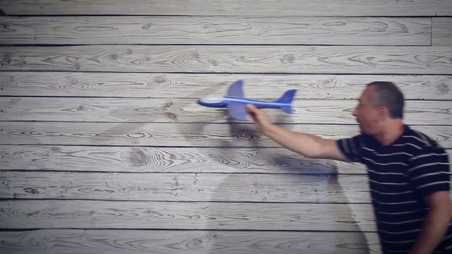 man playing with the plane