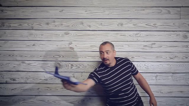 man playing with the plane