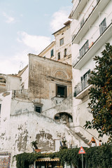 Amalfi coast in Italy, the most beautiful city. Streets and old architecture, narrow passages, shops and cafes. View from the sea and above