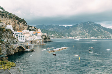 The Amalfi coast and the mountain slopes with plantations of lemons. Panoramic view of the city and...