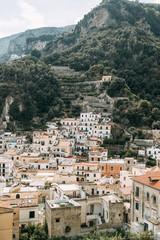 Fototapeta na wymiar Amalfi coast in Italy, the most beautiful city. Streets and old architecture, narrow passages, shops and cafes. View from the sea and above