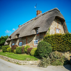 Fototapeta na wymiar Thatched Cottage English Village House 