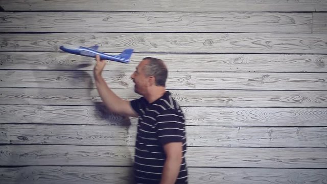 man playing with the plane