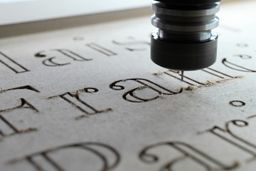 Laser machine cutting letters