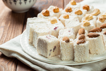 Turkish delight on a wooden table.