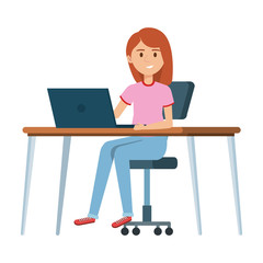 young woman at desk with laptop