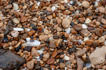 wet stones on the sea shore