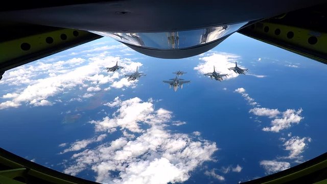 Shot of 6 F-16s breaking away