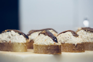 Tasty russian salad with anchovy tapas