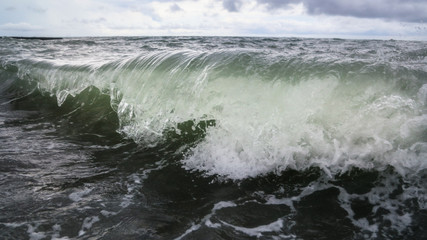 Storm waves on the seashore as a background