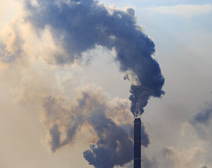 Smoke from the pipes of the factory