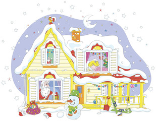 The night before Christmas, Santa Claus with his gifts for a little girl in a snow-covered house