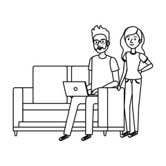 young man on the sofa with laptop and girl