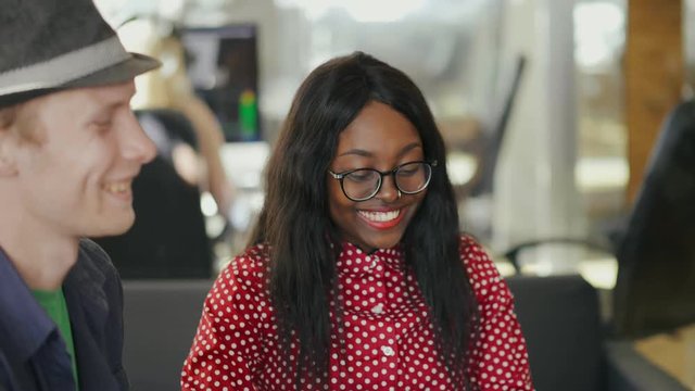 Multi-ethnic students have fun playing game of making words from letters