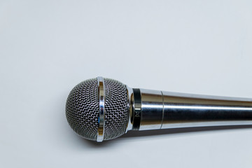 Obraz premium Silver audio microphone on white background