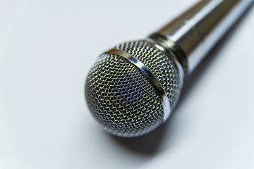 Obraz premium Silver audio microphone on white background