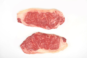 fresh raw steak isolated on white background.