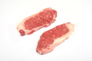 fresh raw steak isolated on white background.