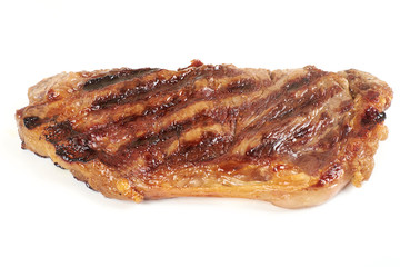 Grilled beef steak isolated over white background.