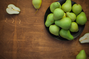 Pears on wooden table