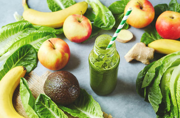 Ingredients for a tropical fruit smoothie with avocado, spinach and banana