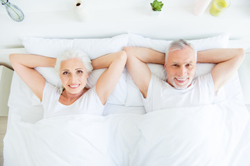 Morning concept. High angle top view photo of two gray hair peop