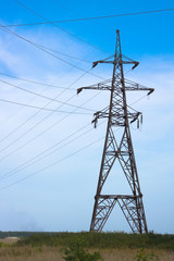 silhouette electricity pylons and power lines