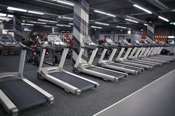 Modern equipment in new gym indoors