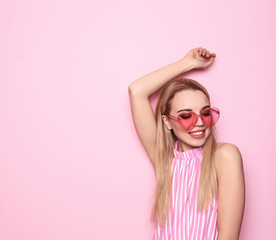 Portrait of beautiful young woman on color background