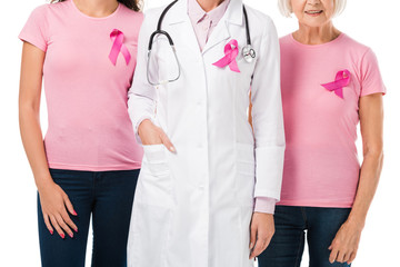 cropped shot of doctor and women with breast cancer awareness ribbons isolated on white