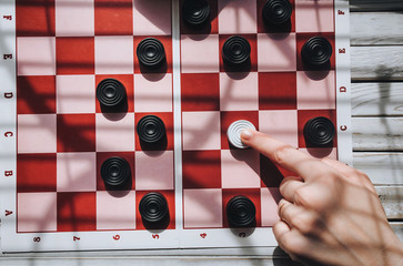 Loss of checkers. The situation is deadlocked concept. Zugzwang. The man chose the wrong tactics.
